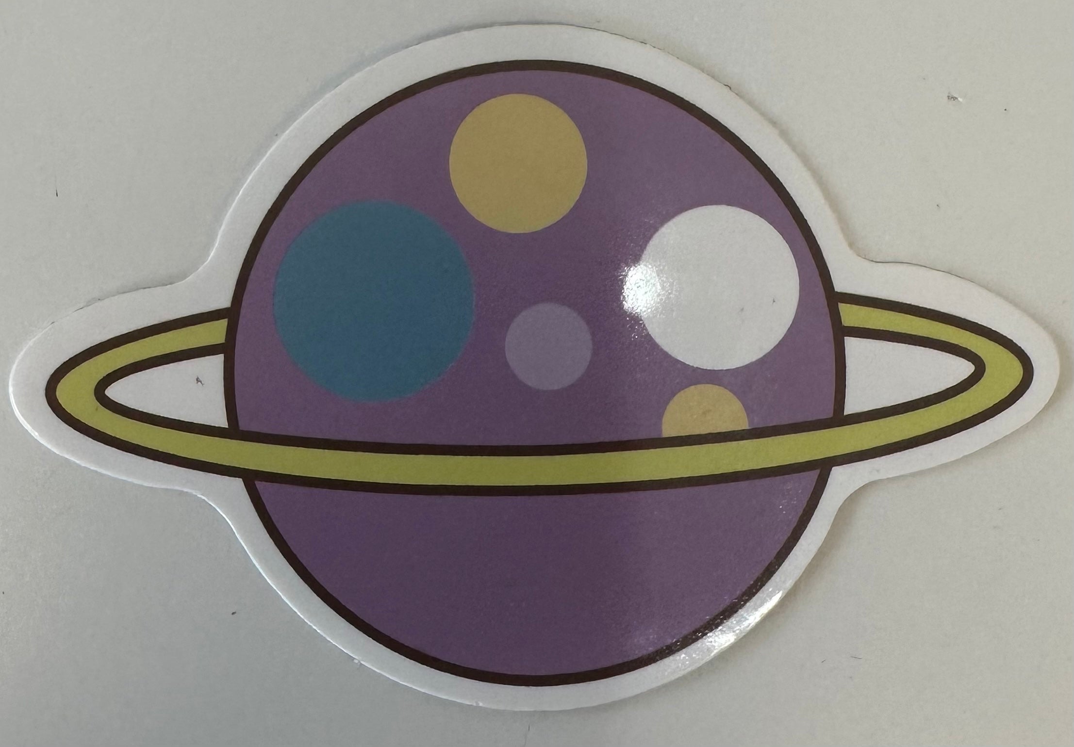 Purple Saturn Sticker